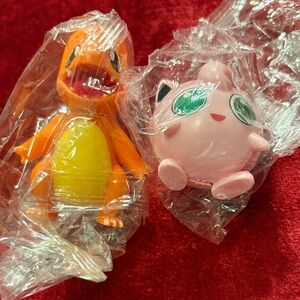 Pokémon Jigglypuff and Charmander new in plastic not opened collectible